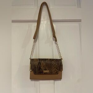 Jessica Simpson purse. Carried one. Excellent condition.
